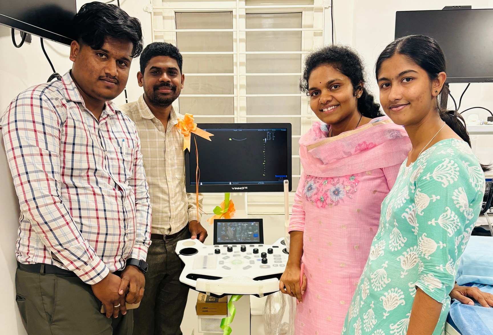 Dr. Manogna Reddy with the clinic's new ultrasound machine